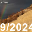 A rainbow seen in the distance behind Mt. Jumbo in Missoula, MT.